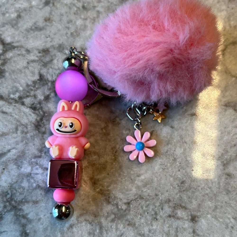 Pink Silicone Labubu Keychain with Pom Pom and Floral Accent - Picture 8 of 8